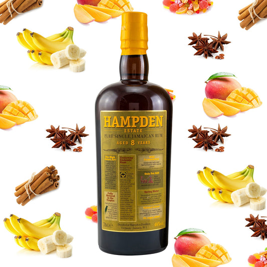 Schwarzbach Spirits bottle of Hampden Estate 8 Year Old Pure Single Jamaican Rum surrounded by tropical fruits and spices.