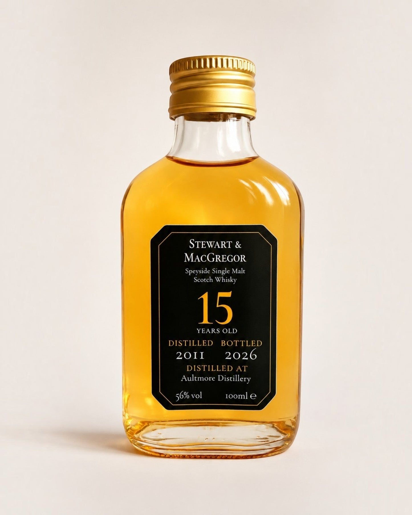 Schwarzbach Spirits Aultmore 15 Year Old single malt Scotch whisky in a 100ml bottle with a gold cap.