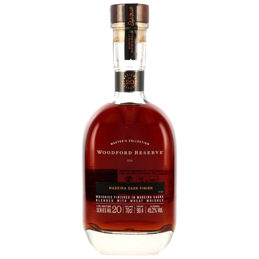 Schwarzbach Spirits Woodford Reserve Master's Collection Madeira Finish Blended Whiskey, 45,2% Vol., 0,7l Flasche mit bernsteinfarbener Flüssigkeit.